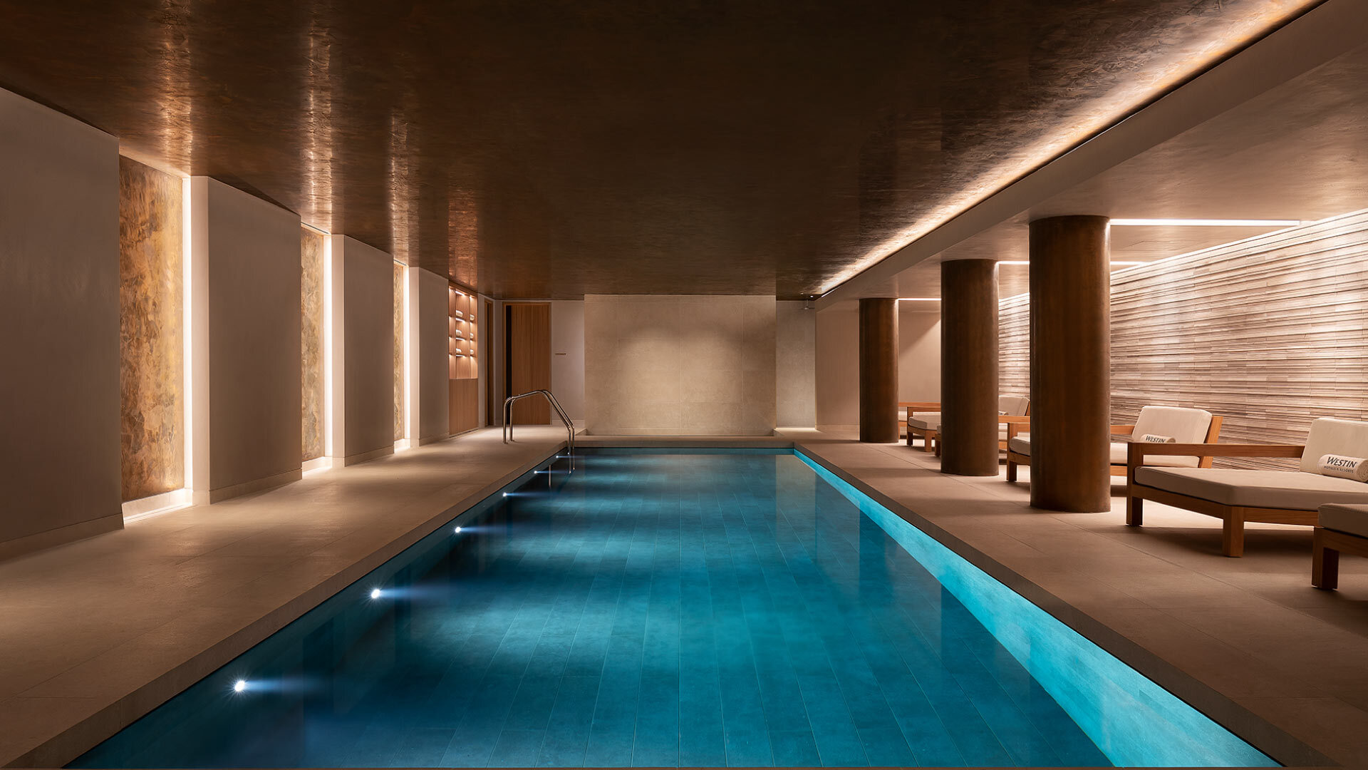 5 best Spas in the City of London - Heavenly Spa Pool 5 best Spas in the City of London - Heavenly Spa Pool - pristine still indoor pool with loungers along the side