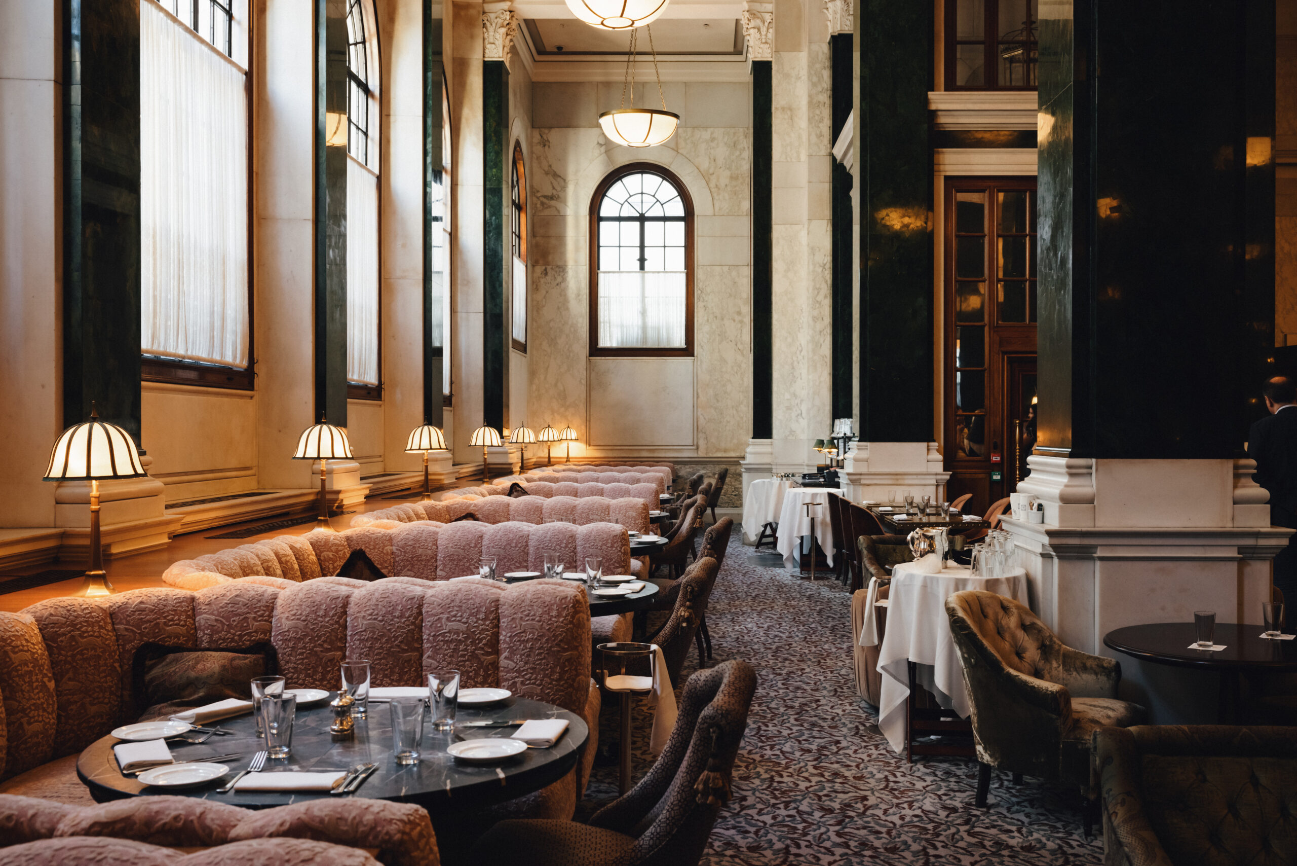 Afternoon Tea Spots in the City of London - Millie’s Lounge at The Ned Afternoon Tea Spots in the City of London - Millie’s Lounge at The Ned - high ceiling soft booth seating with mood lighting