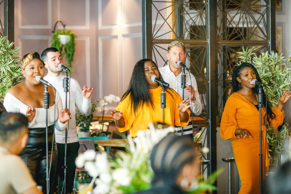 9 Best Brunch Spots in the City of London - Gospel Motown Brunch 9 Best Brunch Spots in the City of London - Gospel Motown Brunch - a group of gospel singers men and women performing in front of guests