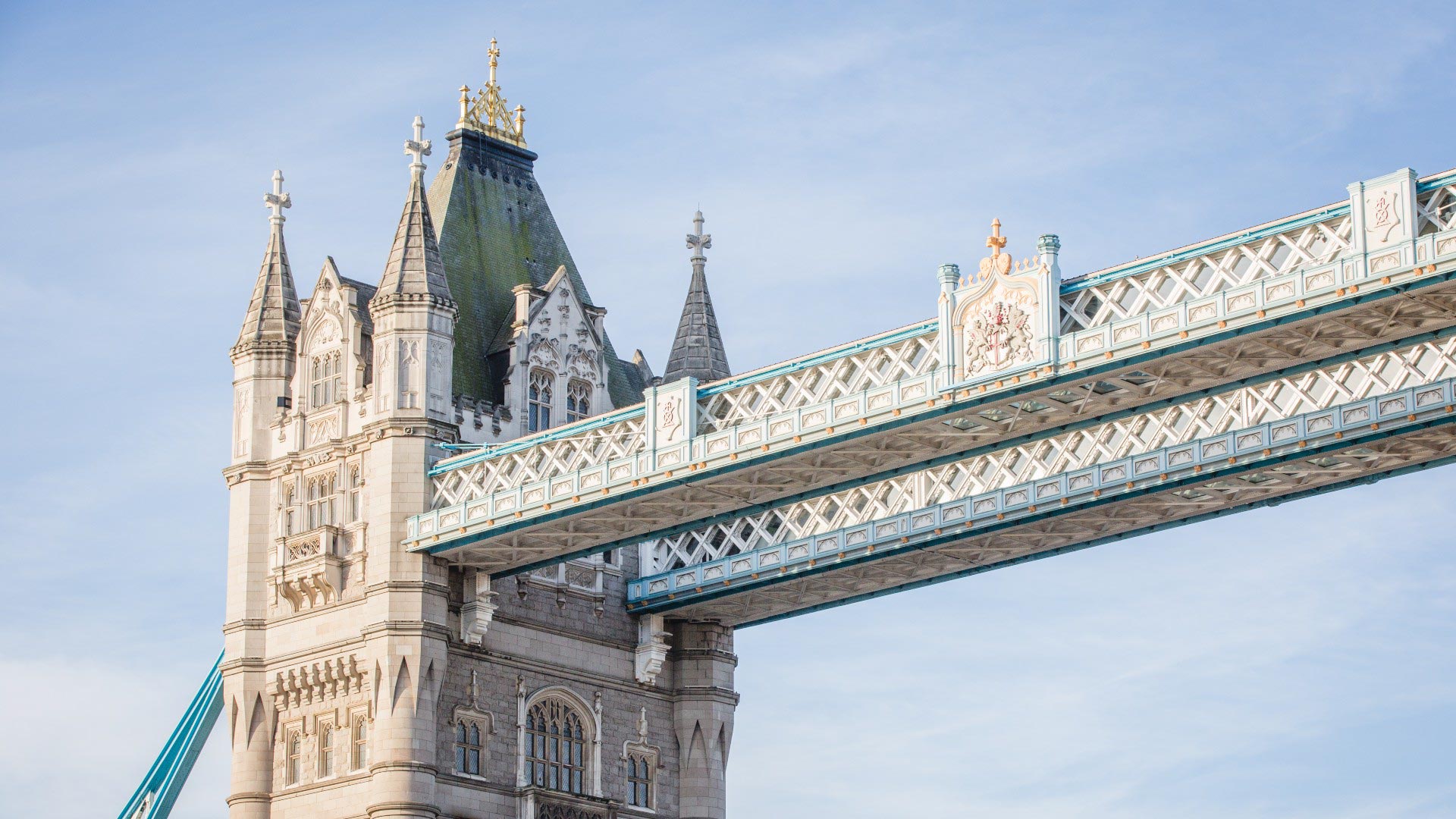 Family Fun Activities to Enjoy on the Weekend in the City of London - Tower Bridge Family Fun Activities to Enjoy on the Weekend in the City of London - a picture of tower bridge on a sunny day, cropped to show just the tower an upper part of the bridge