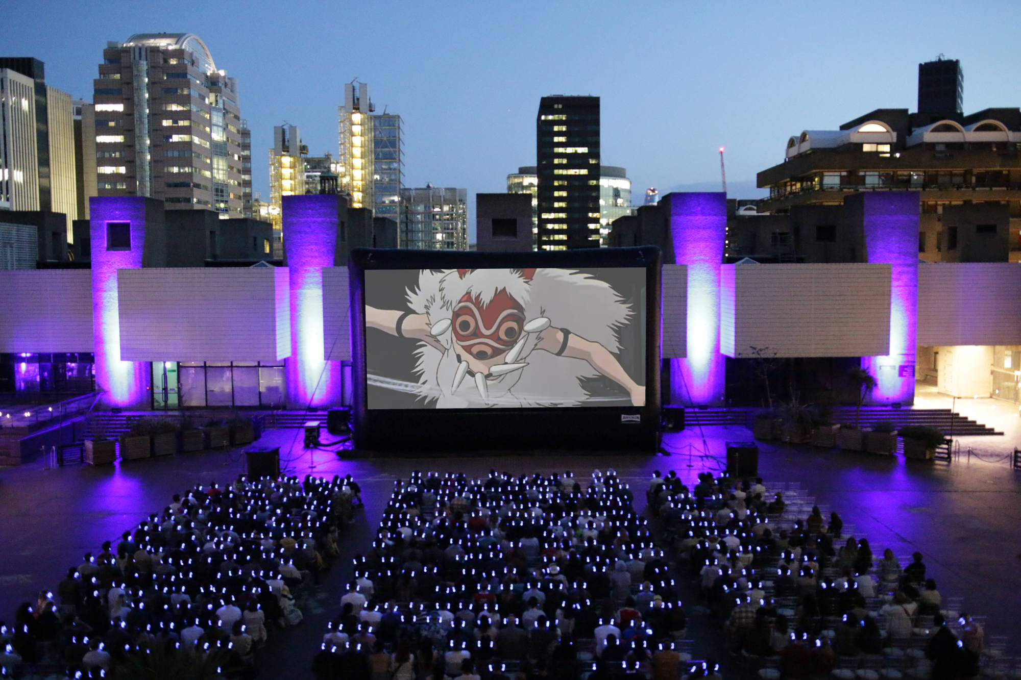 Outdoor Cinema at the Barbican Centre - large outdoor cinema screen in urban setting