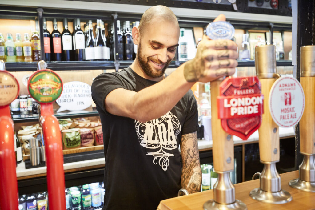 The Hydrant - barman pulling a pint