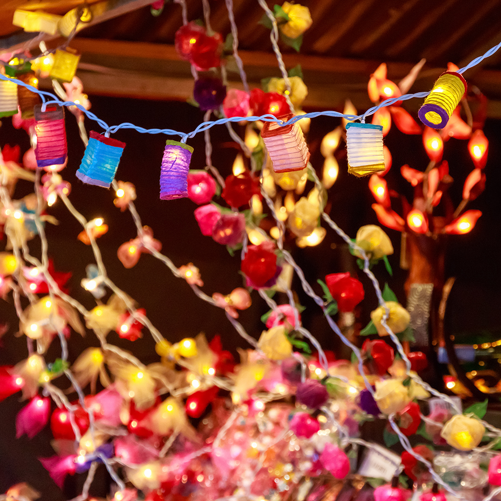 Christmas lights decorations hanging from the ceiling