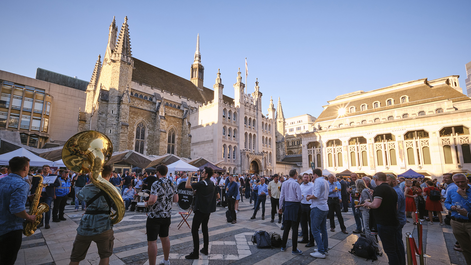 crowds and live band in a historic yard