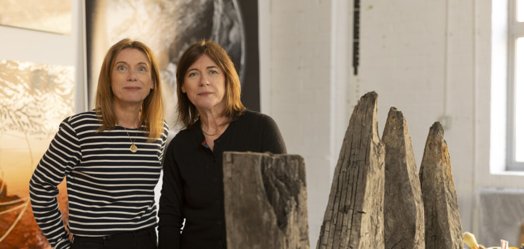 Artists Jane and Louise Wilson in a gallery setting.