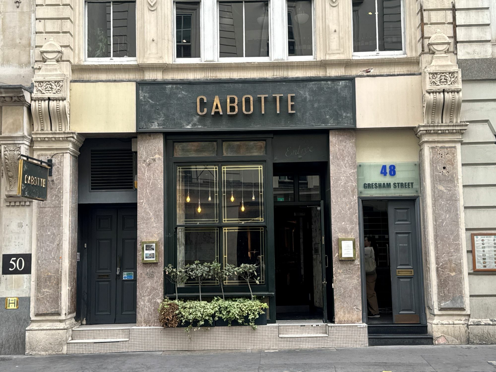 The front of Cabotte on Gresham Street, showing dark signage with the store name on the front in gold/brown