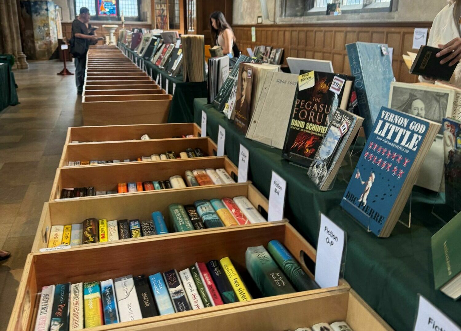 Book shelves stocked inside St Giles Cripplegate Book Fair